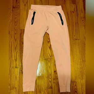 Very light pink zip pocketed joggers Size small
